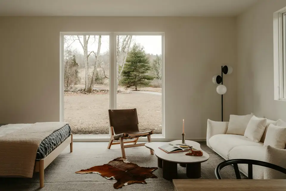 Bright minimal lounge with a large window, a garden lounge idea for Gosforth